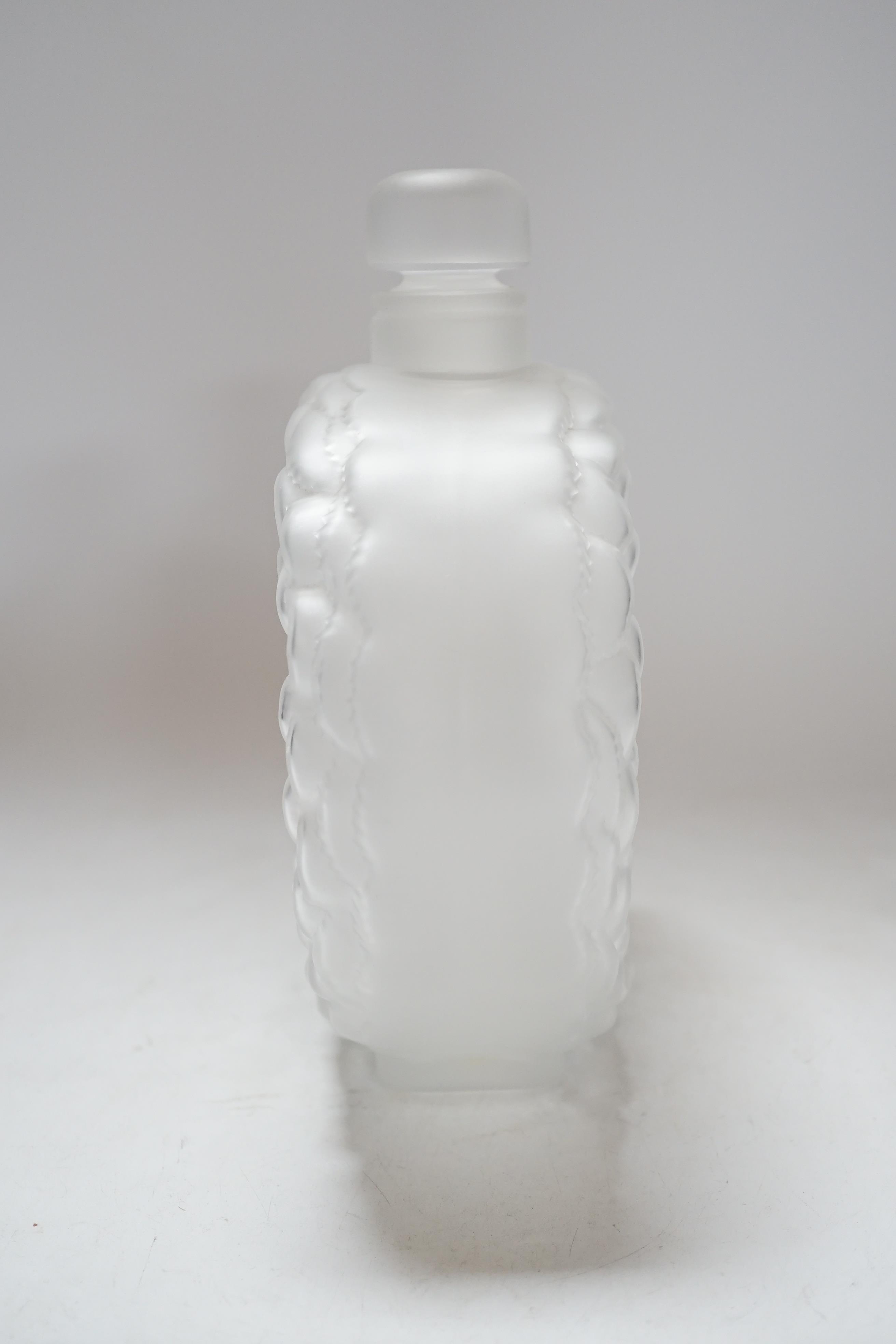 A large Lalique ‘dahlia’ patten perfume bottle and stopper, signed to the base, 21cm high